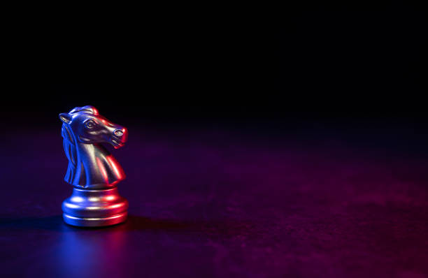istock Golden Chess horse standing alone on the chessboard 1316805567