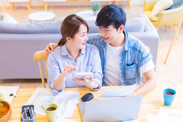 istock couple discuss finances at home 1316805836