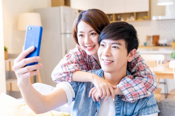 istock asian couple take selfie 1316805899