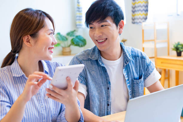 istock couple discuss finances at home 1316806418