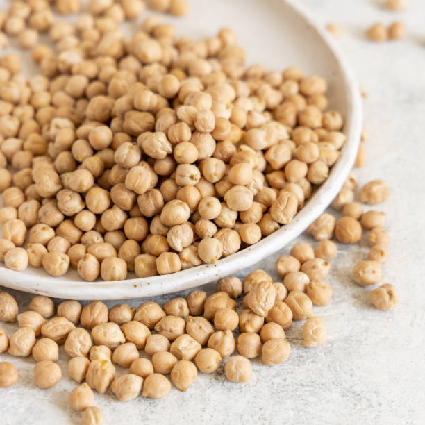 istock Plate of raw dry chickpea 1316806854