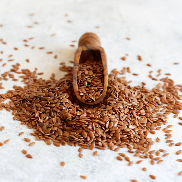 istock Raw Flax seeds in a wooden scoop 1316806923