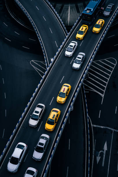 istock Aerial View of Complex Overpass and Busy Traffic 1316807350