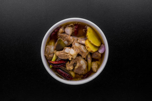istock Spicy pork spare rib soup with herbs 1316807357