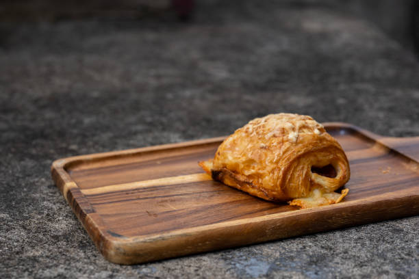istock Croissant Roll Ham Cheese on Wooden 1316808124
