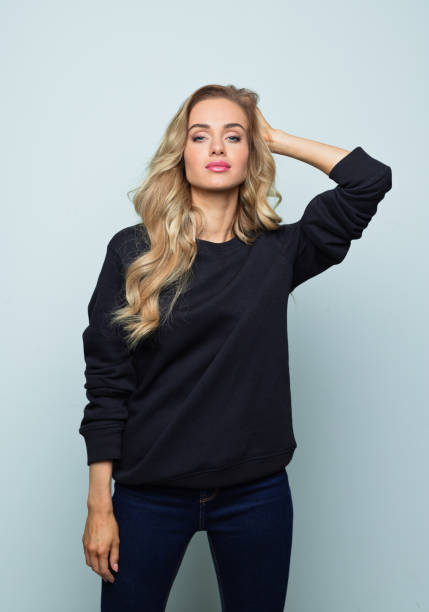istock Confident young woman in black clothes 1316808700