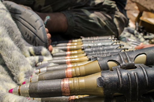 soldier prepares weapon ammunition