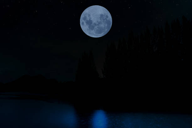 istock Full moon on sky over lake in the night. 1316810138