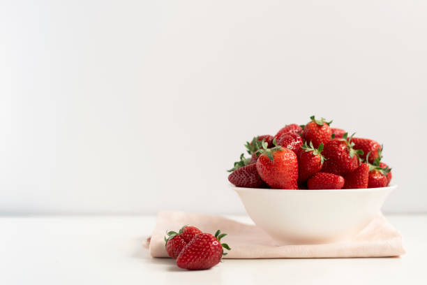 istock Bowl with fresh strawberries, healthy eating concept 1316813117
