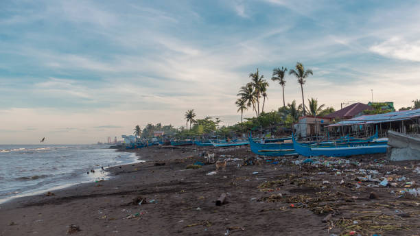 Naic, Cavite, Philippines - An extremely polluted beach littered with garbage and other debris. Early morning shot. Part of Manila bay.