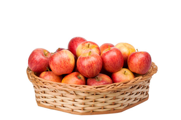 istock red apples in wicker basket on isolated white background 1316820615
