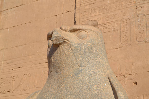 Ancient egyptian statue of falcon god Horus at the Temple of Edfu. Egypt