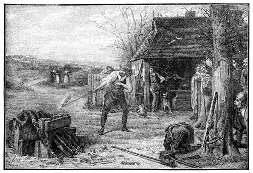 People doing early experiments of gunpowder and cannons in the late 13th century Europe. Vintage etching circa 19th century.