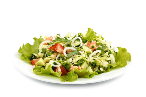 istock Fresh vegetable salad isolated on a white background 1316831450