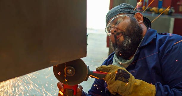 istock Metal Worker Working on Range Hood - Portrait 1316831518