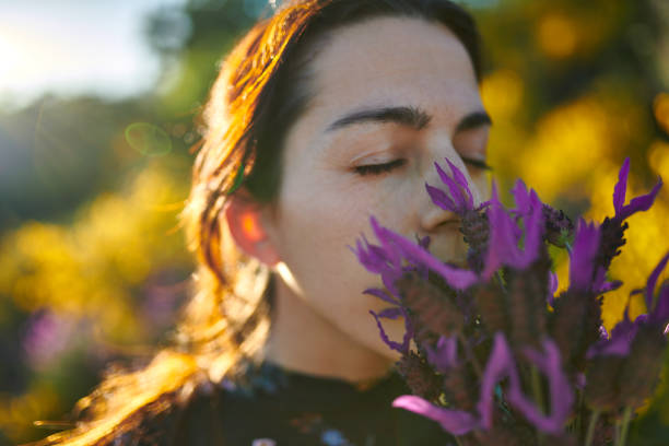 istock Girl picking flowers 1316832673