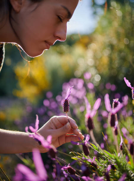 istock Girl picking flowers 1316832692