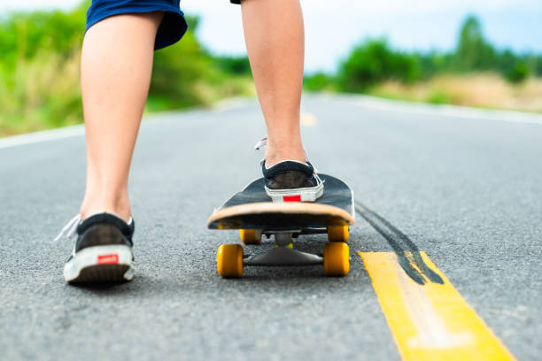 istock Child Play Skateboard in Countryside 1316833874
