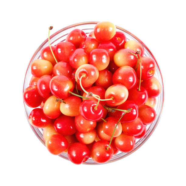 istock Sweet cherries in a bowl isolated on white background 1316838413