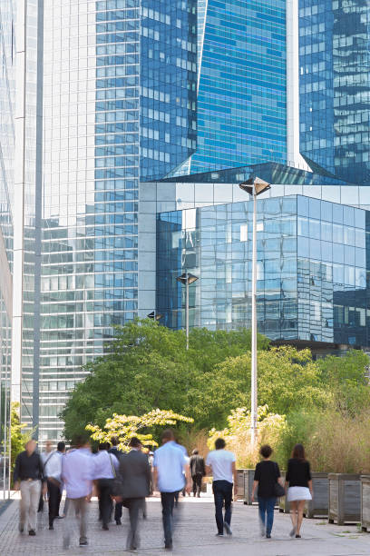 istock Office Workers Walking Toward Business Buildings, La Defense, Paris 1316841459