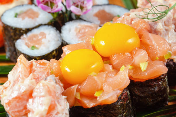 istock Sushi and rolls with red fish and raw quail eggs 1316842652