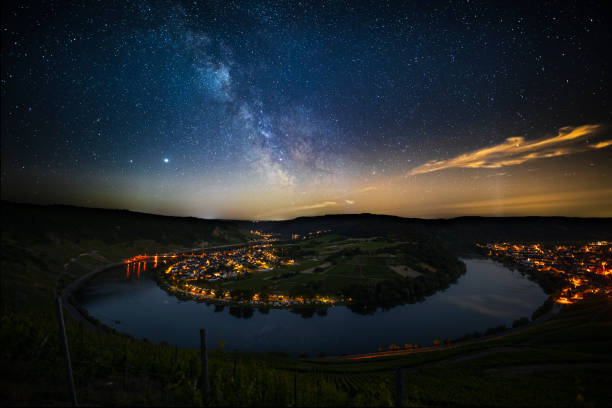 Milky way over Mosel River Bend Starry night sky with milky way moving over a Mosel River bend in the vineyards of the famous Mosel valley in Rhineland-palatinate in Germany - Europe rhineland palatinate photos stock pictures, royalty-free photos & images