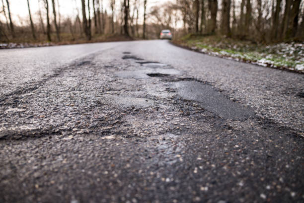 istock Damaged old mountain road. 1316849399