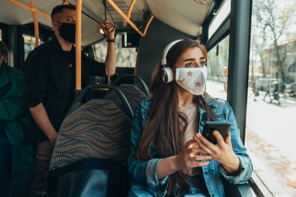 istock People wearing masks in the bus while using public transport 1316853903