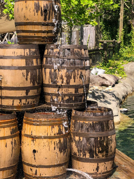 Wooden barrels for natural onsen, steam hot water from natural hot springs, soft focus.