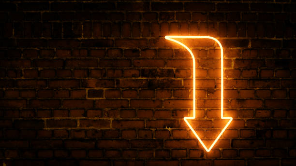 istock 3D rendering of glowing neon arrows on a brick wall background 1316859214
