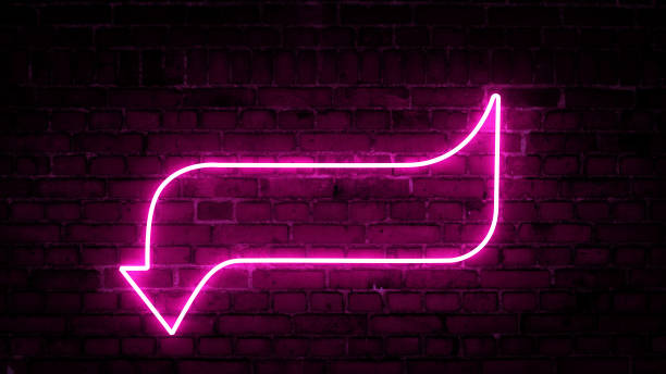istock 3D rendering of glowing neon arrows on a brick wall background 1316859307