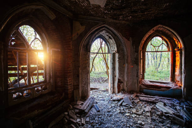 istock Inside old ruined abandoned historical mansion in Gothic style 1316862353