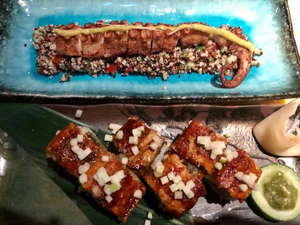 istock Fine dining, crispy octopus tentacle and unagi sushi in japanese restaurant 1316865244