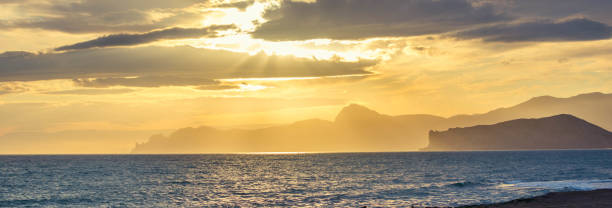 istock Sunset by the sea 1316868968