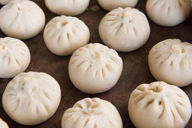 istock Chinese traditional food steamed stuffed buns in a container 1316876552