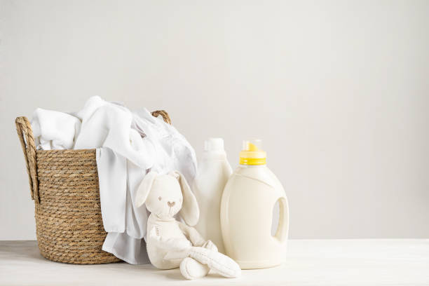 istock Mockup for washing baby clothes with copy space. 1316877235