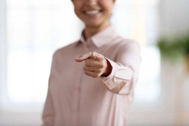 Hand of business woman pointing finger at camera Hand of business woman pointing finger at camera. Happy female recruiter choosing you. HR professional selecting job candidate. We want you, recruiting, hiring concept. Close up shot i want you stock pictures, royalty-free photos & images