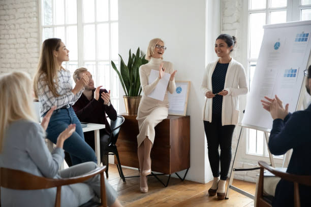Business team expressing recognition to best manager