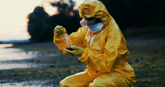 A look at a toxicology specialist working their usual shift. They're taking a sample that's about to be tested.