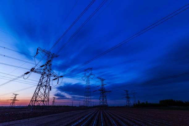 istock Pylons, high voltage pylons in the evening 1316882042