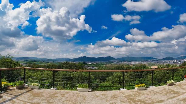 istock Clouds and mountain scenery floating in the dynamic blue sky 1316883461