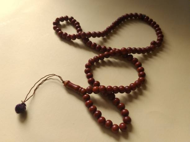 istock the prayer beads are placed on a yellow background 1316888061