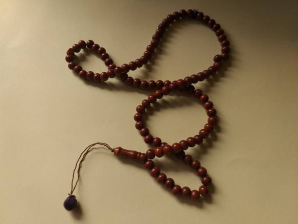 istock the prayer beads are placed on a yellow background 1316888087