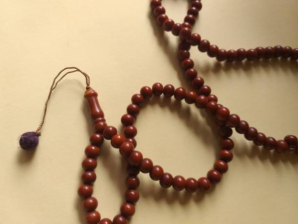 istock the prayer beads are placed on a yellow background 1316888092