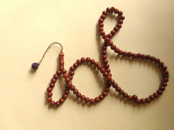 istock the prayer beads are placed on a yellow background 1316888129
