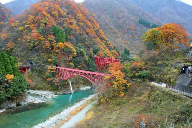 Photo of Yamahiko red Bridge in Kurobe Gorge, a famous place in Toyama.