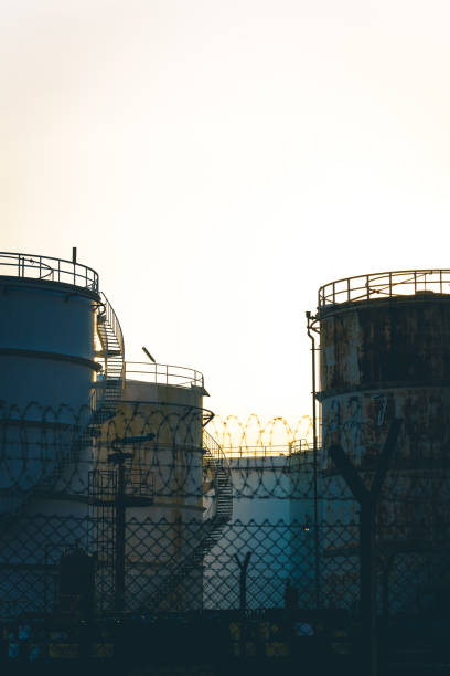 istock An oil refinery as seen from behind a chain link fence. 1316892133