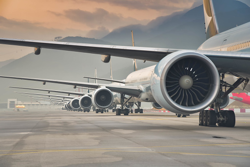 Hong Kong, Feb 12,2020: Due to Coronavirus Covid-19 airline fleet grounded at the Airport taxiway. The largest Hong Kong based carrier Cathay Pacific Airways grounded most of their aircraft fleet. Those aircrafts lined up at on the taxiway and waiting to transfer to out port for a long term parking.
