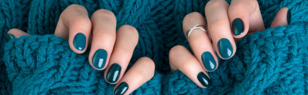 istock Manicured woman's hands in warm wool turquoise sweater 1316898373