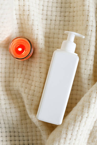 istock White Plastic dispenser bottles with body cream 1316899072